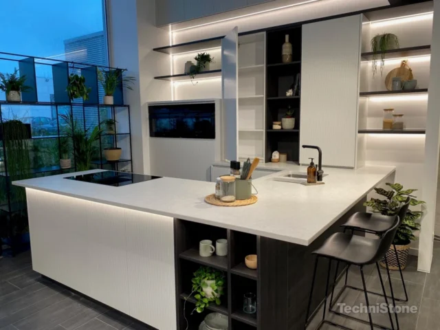 High end open concept kitchen with modern island and custom cabinetry inspiration