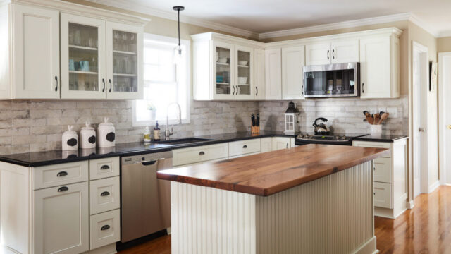 Transitional kitchen design with wood island and white cabinetry inspiration