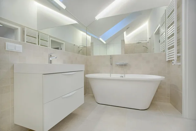 Modern white bathroom with freestanding tub and skylight ceiling inspiration