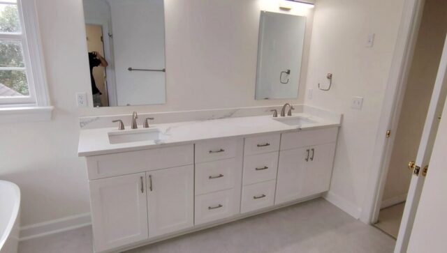 White double sink vanity with quartz countertop in Chesapeake Virginia bathroom renovation