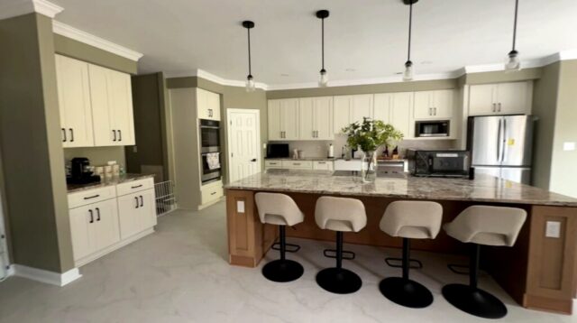 Open concept kitchen renovation featuring custom island cabinetry and quartz countertops in Virginia Beach VA