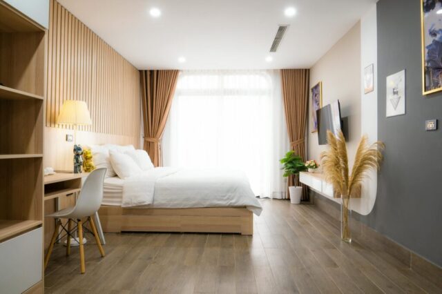 Contemporary bedroom with wood flooring and natural lighting design inspiration